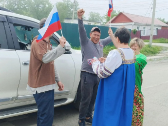 Под флагом России